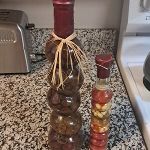 Elegant Glass Art Bottles with Red Accents